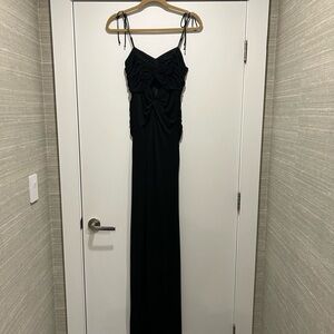 Beautiful high low dress with a keyhole cut out at the bodice.